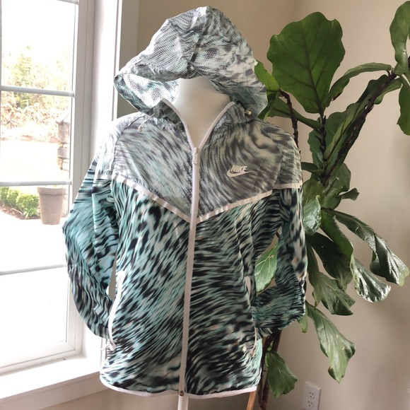 Nike Jackets & Blazers - NIKE woman’s zebra print nylon jacket RARE M